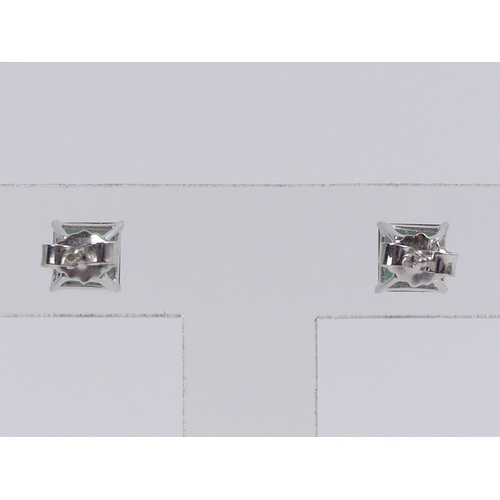 21 - A pair of 18ct white gold tourmaline earrings, 1.5 grams, 6.5mm.