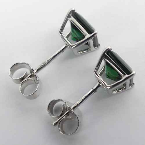 21 - A pair of 18ct white gold tourmaline earrings, 1.5 grams, 6.5mm.