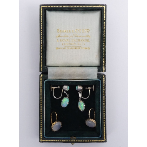 22 - A pair of 9ct gold opal earrings and a pair of gold agate earrings, 5.8 grams, opals 23.5mm.