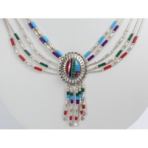 29 - Native American sterling silver, multi-strand necklace, set with turquoise, coral and malachite, 20 ... 