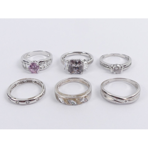 3 - Six silver stone set rings, one set with a diamond, 20 grams, five size O, one size S.