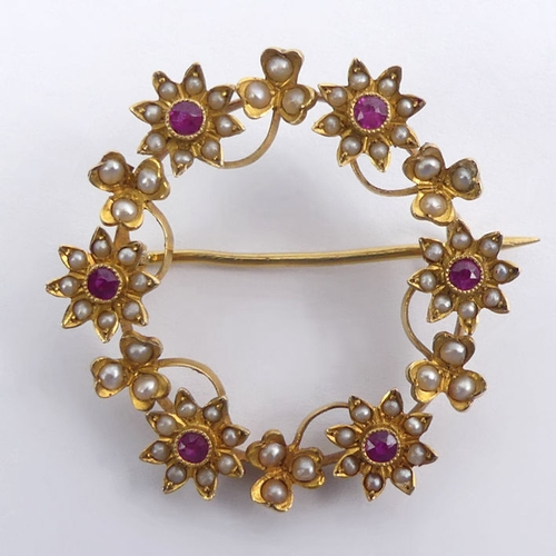 40B - 18ct gold, ruby and seed pearl brooch, 5.2 grams, 31mm diameter.