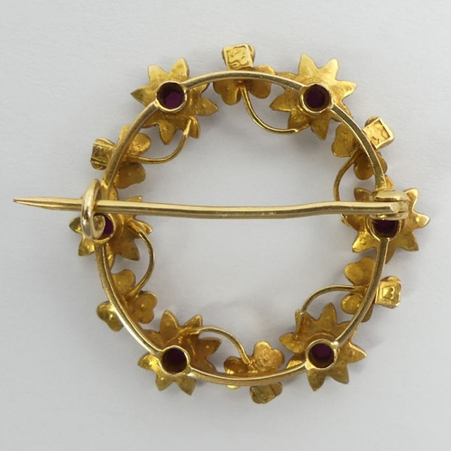 40B - 18ct gold, ruby and seed pearl brooch, 5.2 grams, 31mm diameter.