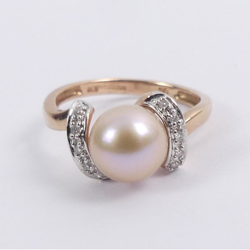 44 - 9ct rose gold, cultured pearl and diamond ring, 2.4 grams, 8mm, size K.