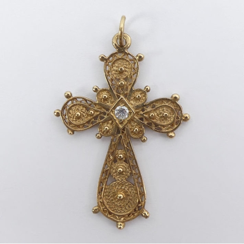 55 - 9ct gold filigree cross pendant, 3.5 grams, 43mm.