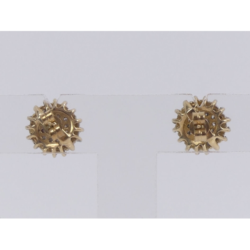 56 - A pair of 9ct gold diamond cluster earrings, 3.5 grams, 12mm.