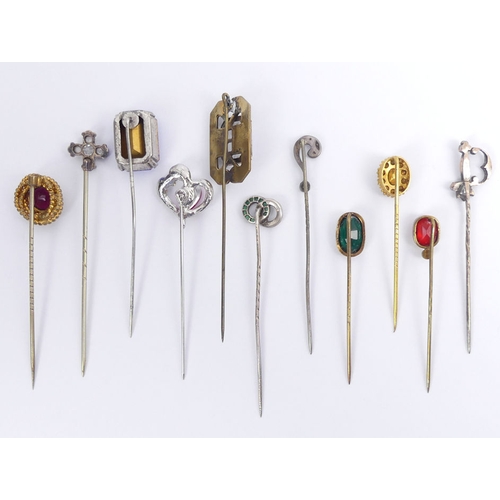 65 - Ten assorted paste set stick pins, including a sword design example, 72mm.