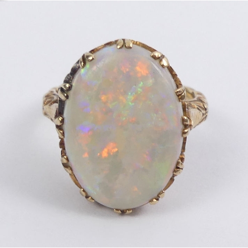 65A - 9ct gold opal ring, 4.6 grams, 19mm, size M.