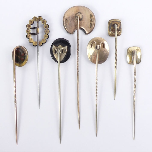 67 - Eight Victorian mourning stick pins, including a gold an enamel 'In Memory Of' example, longest 88mm... 