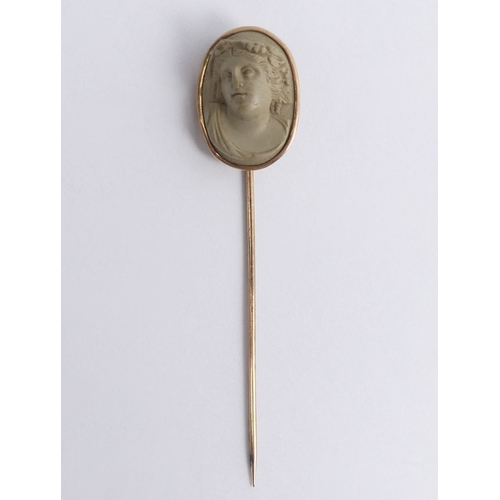 75 - Finely carved lava cameo 15ct gold (tested) stick pin, 20.5mm x 15mm.