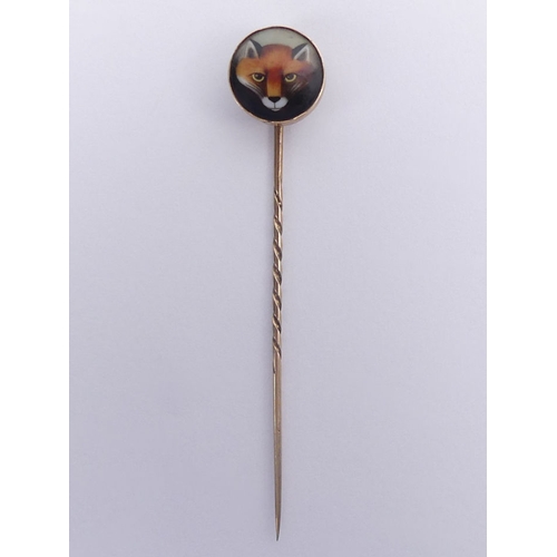 77 - 9ct gold (tested) hand painted fox design stick pin, 2.5 grams, 14m in diameter, 76mm long.