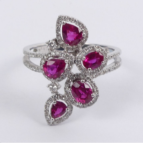 84 - 18ct white gold, ruby and diamond ring, 5.9 grams, 23.5mm. Size R 1/2. 23.5 mm wide.