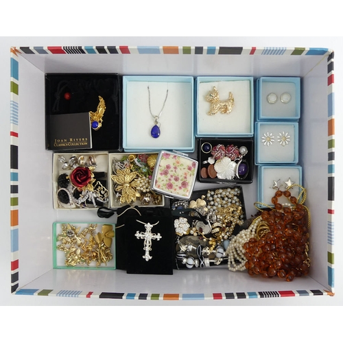 96 - A box of mixed costume jewellery, including a silver and diamond bracelet, amber items and a Joan Ri... 