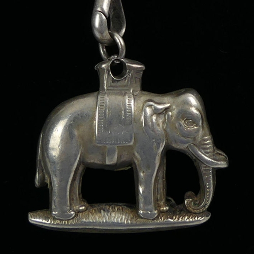 101 - Silver pocket watch Albert chain with elephant fob, 24.4 grams, 36.5cm.