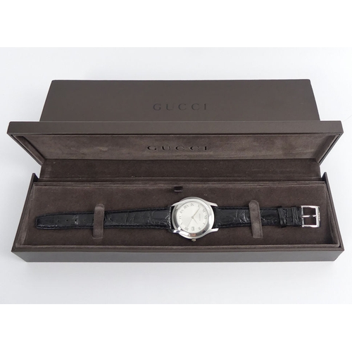 106 - Gents Gucci 5500m date adjust quartz watch, boxed, 36.8mm.