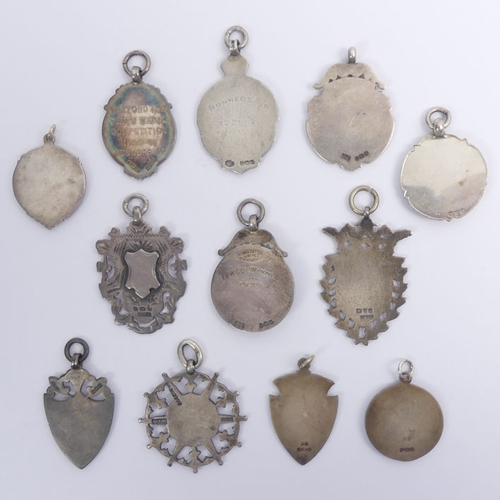 119A - Twelve silver pocket watch chain fobs, various dates and makers, 94 grams.