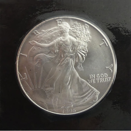 180 - 1995 USA one ounce fine silver eagle dollar.