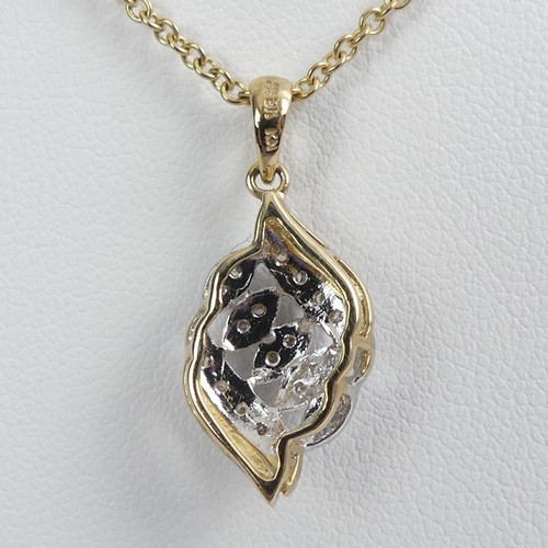 100 - 9ct gold diamond pendant and chain, 4.2 grams, pendant 25mm.