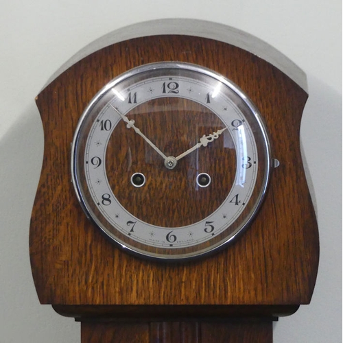 482 - A 1930's oak grandmother clock, 135cm x 26cm x 18cm.
Collection own Courier Only.