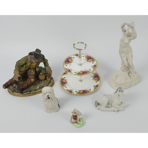 390 - Ceramics to include a Parian Ware Figure of a Lady Holding Flowers, Sylvac Dog, Capodimonte Figure, ... 