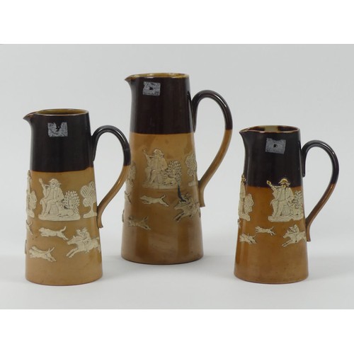 395 - 3 graduated Doulton Lambeth Stoneware Harvest Ware Jugs.