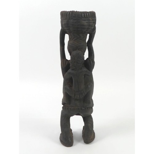 478 - A carved Luba female fertility figure, 39cm.