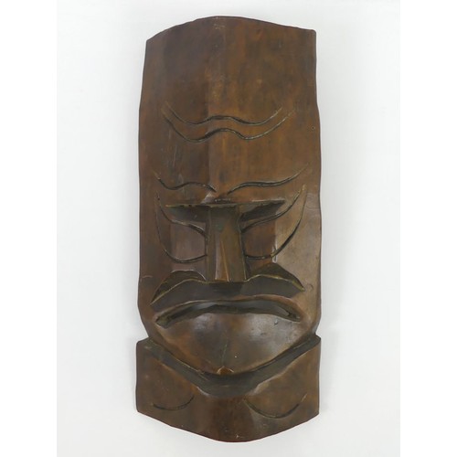 479 - A carved African tribal mask, 42cm x 24cm.