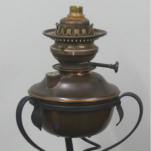 497 - An Arts & Crafts wrought iron and copper standard lamp, 142cm.
Collection own Courier Only.