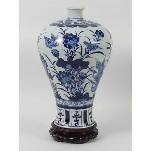 388 - Chinese Mei-Ping blue and white porcelain vase and stand, 44cm.