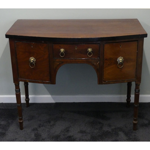 483 - A 19th century mahogany bow front sideboard with lion mask handles. 90cm high x 114cm wide. Collecti... 