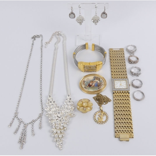 1 - A box of mixed costume jewellery, including a Joan Rivers watch and silver rings.