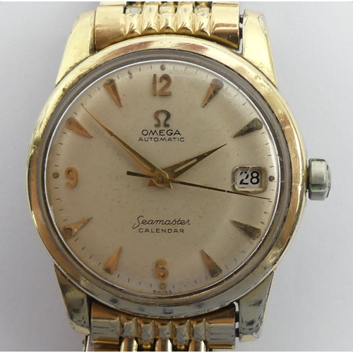 102 - Gents Omega automatic gold tone calendar watch, 36mm .