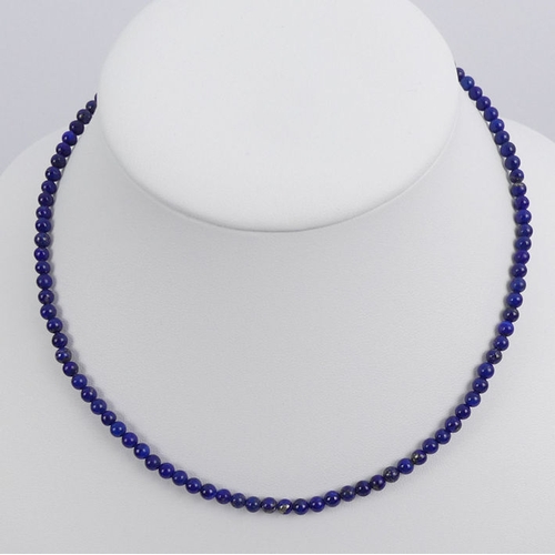 30A - A lapis lazuli bead necklace with a 9ct gold clasp, 11 grams, 42 cm x 4.2 mm.