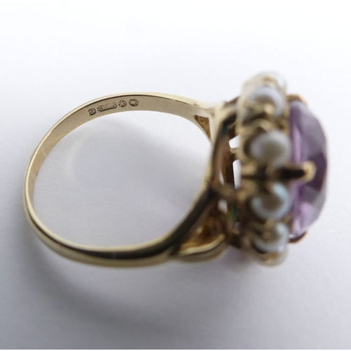 33 - 9ct gold, amethyst and seed pearl ring, London 1965, 4.4 grams, 17mm, size M 1/2.