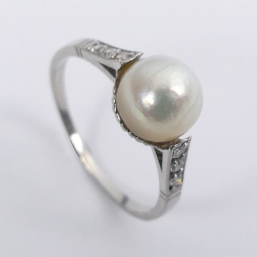 47 - Platinum 950, pearl (un-tested), and diamond set shoulders ring, 3 grams, 7.3mm, size P.