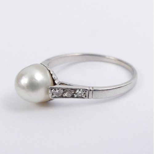 47 - Platinum 950, pearl (un-tested), and diamond set shoulders ring, 3 grams, 7.3mm, size P.