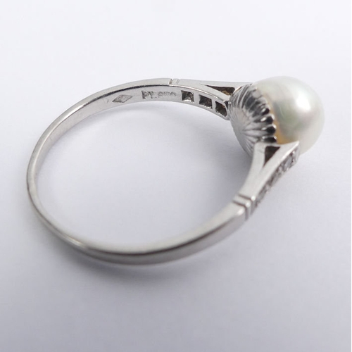 47 - Platinum 950, pearl (un-tested), and diamond set shoulders ring, 3 grams, 7.3mm, size P.