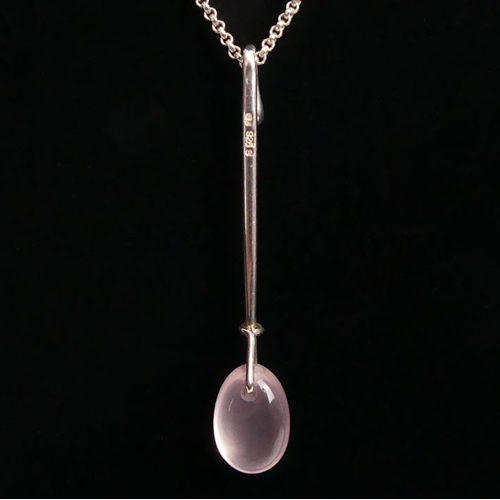 52 - A boxed Georg Jensen silver and rose quartz pendant and chain, 5.1 grams, pendant 45mm, chain 46cm.