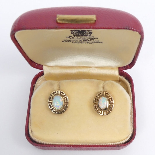 58 - A pair of 9ct gold opal set earrings, 3.5 grams, 12.9mm x 10.8mm.