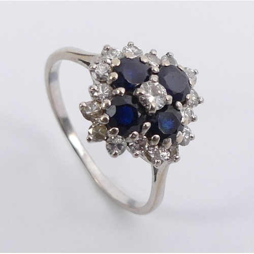 60F - 18ct, white gold (tested) sapphire and diamond ring, 3.4 grams 13.9 mm, size Q 1/2.