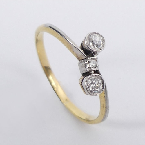 60J - 18ct gold and platinum (tested), three stone, diamond ring, 1.4 grams, size K 1/2.