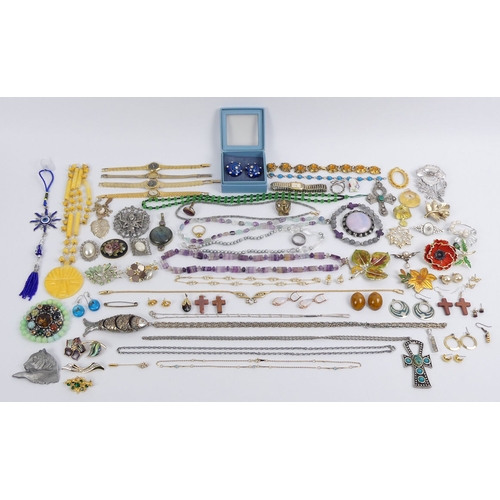 8 - A box of mixed costume jewellery, including stone set brooches.