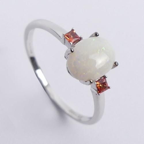 88 - 9ct white gold, opal and orange sapphire ring, 1.6 grams, 8.1mm, size R 1/2.