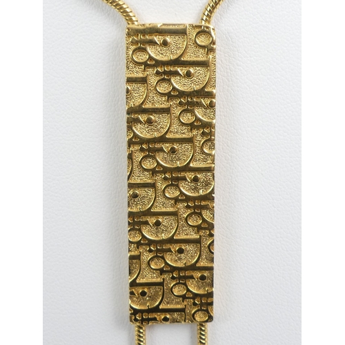 89 - A Christian Dior gold tone pendant necklace, 21.8 grams, pendant 10cm, necklace 42cm.