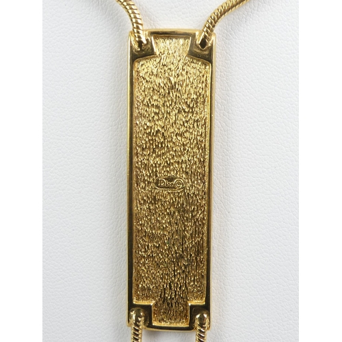 89 - A Christian Dior gold tone pendant necklace, 21.8 grams, pendant 10cm, necklace 42cm.