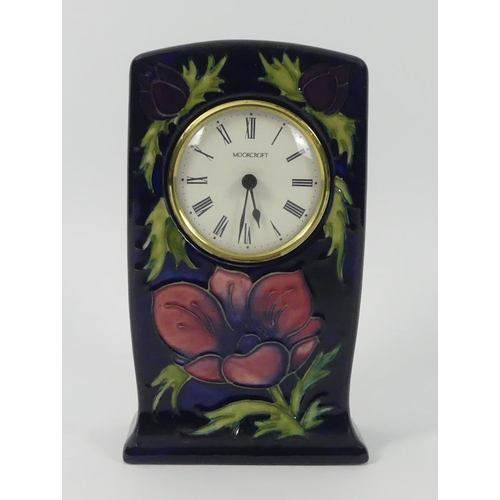 382 - A Moorcroft Anemone pattern tube lined mantle clock signed WM with impressed marks to base, 18cm x 9... 