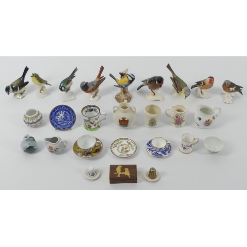 389 - Nine Goebel's birds together with miniature ceramics including Coalport and Masons, 9cm.