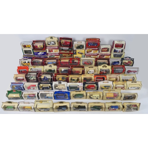 390 - Approximately seventy boxed Days Gone By vehicles, including Matchbox and Lledo.