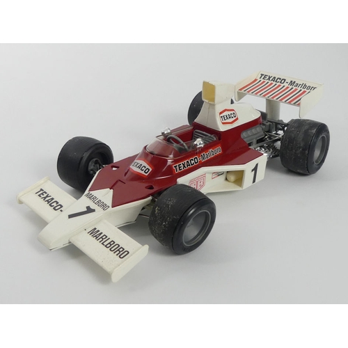 392 - A boxed Schuco McClaren Formula 1 racing car, 29cm.