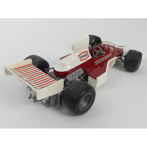 392 - A boxed Schuco McClaren Formula 1 racing car, 29cm.